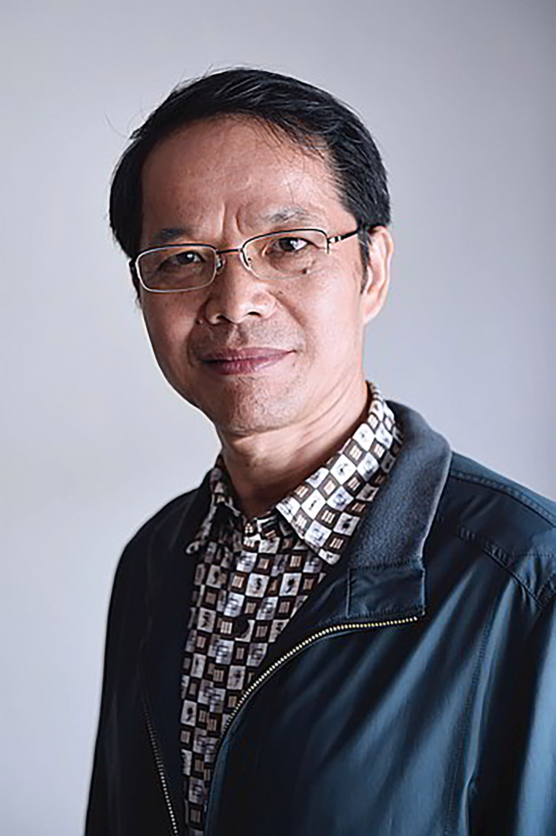 Prof Qing Guo Wang