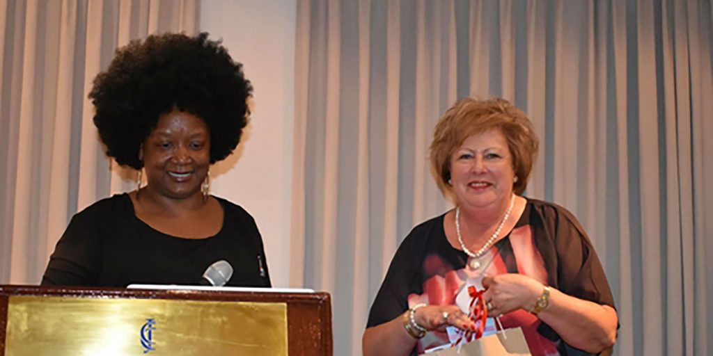 Fos Prof Meyer Gives Mrs Strydom Gift