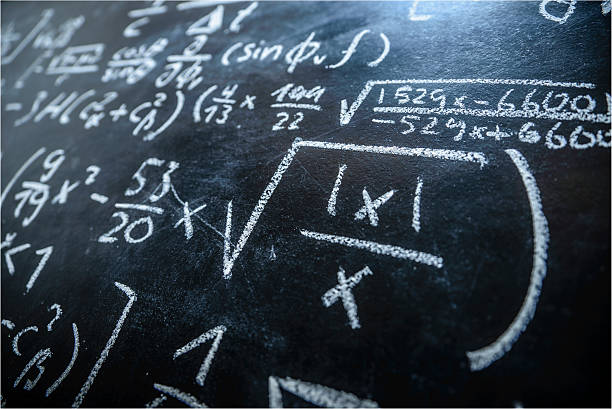 A Blackboard Filled With Formulas And Equations