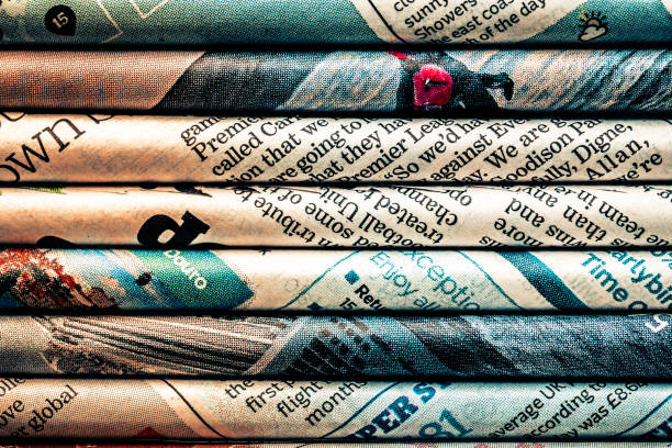 Macro Abstract Image Depicting Rolled Sheets Of Newspaper.