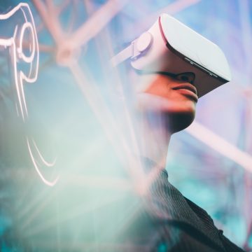 Pretty Young African Girl Adjusting The Vr Headset On The Modern Background.